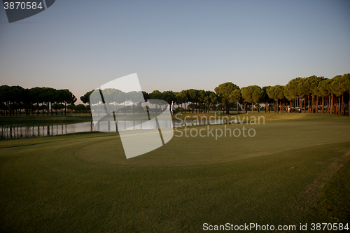 Image of golf course on sunset