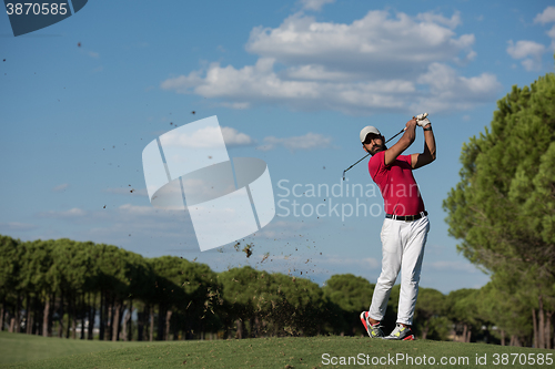 Image of golf player hitting long shot