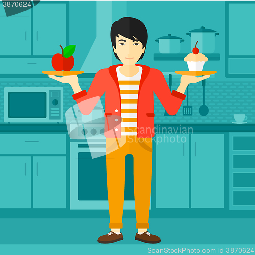 Image of Man with apple and cake.