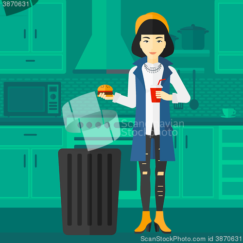 Image of Woman throwing junk food.