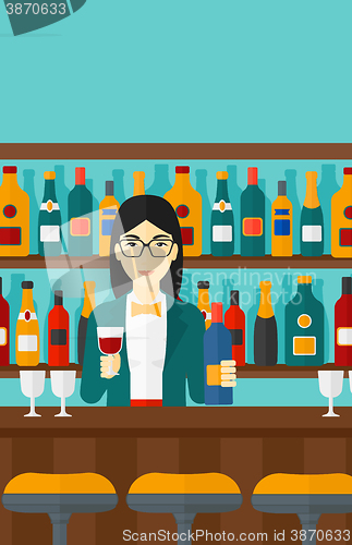 Image of Bartender standing at the bar counter.