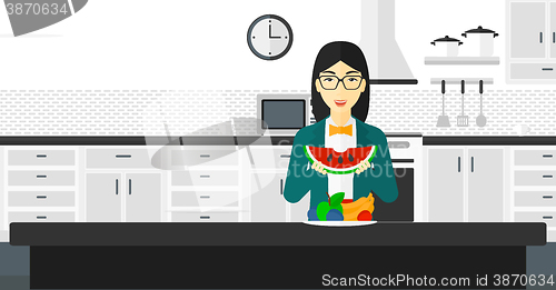 Image of Woman eating watermelon.