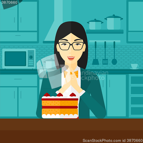 Image of Woman looking at cake.