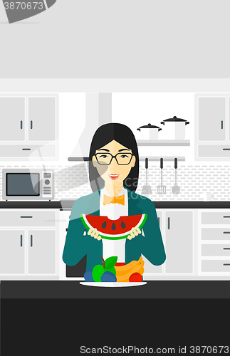 Image of Woman eating watermelon.