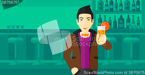 Image of Man holding glass of juice.