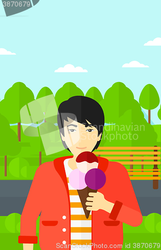 Image of Man holding icecream.