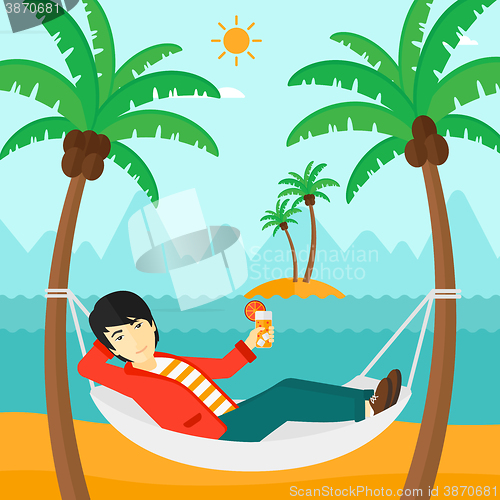 Image of Man chilling in hammock.