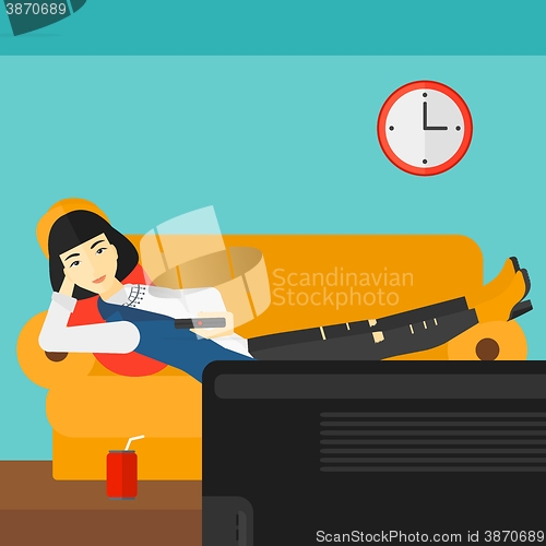 Image of Woman lying on sofa.