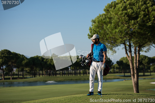 Image of golf player portrait at course