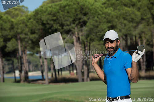 Image of golf player portrait at course