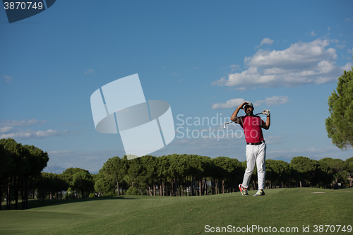 Image of golf player hitting long shot