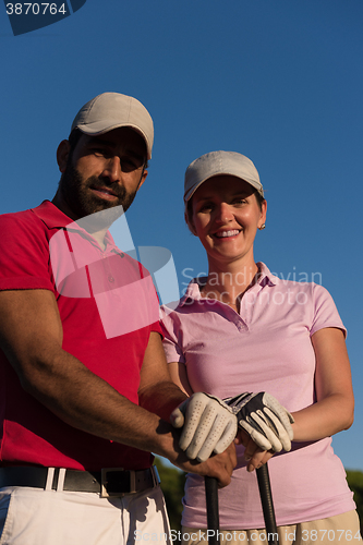 Image of portrait of couple on golf course