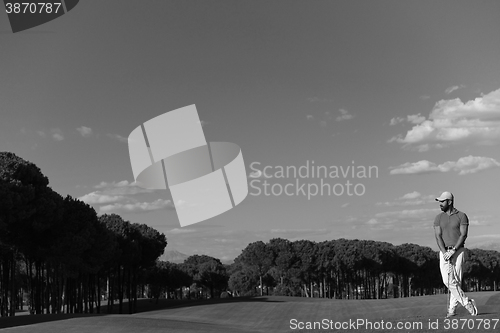 Image of handsome middle eastern golf player portrait at course