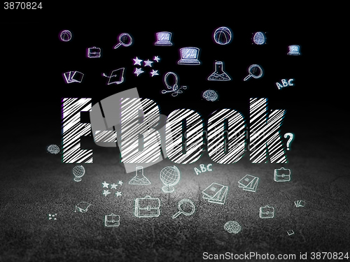 Image of Education concept: E-Book in grunge dark room