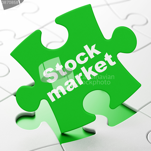Image of Finance concept: Stock Market on puzzle background