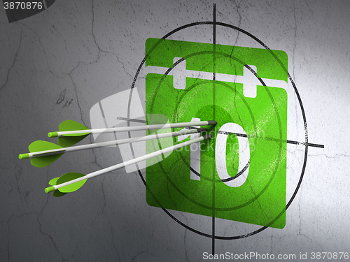 Image of Time concept: arrows in Calendar target on wall background