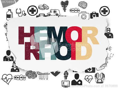 Image of Medicine concept: Hemorrhoid on Torn Paper background
