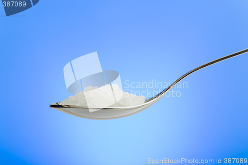 Image of Spoon filled with sea salt