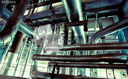 Image of Industrial zone, Steel pipelines, valves, cables and walkways