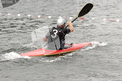 Image of Man paddling in his kayak