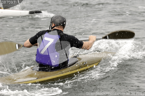 Image of Man in kayak race