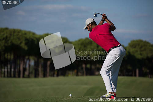 Image of golf player hitting long shot