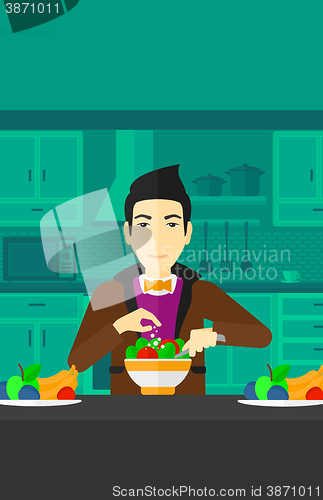 Image of Man cooking meal.