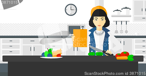 Image of Woman cooking meal.