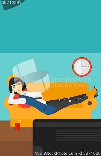 Image of Woman lying on sofa.