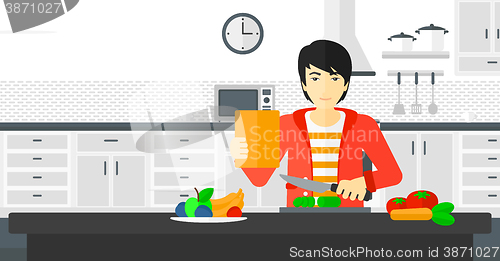 Image of Man cooking meal.
