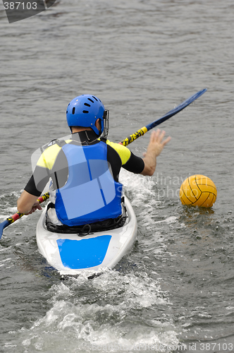 Image of Man playing kayak polo