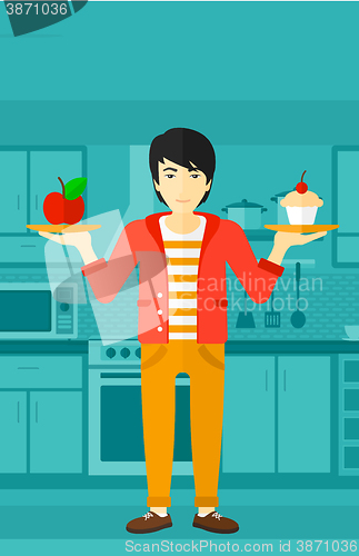 Image of Man with apple and cake.