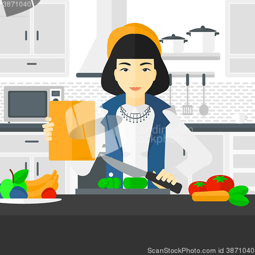 Image of Woman cooking meal.