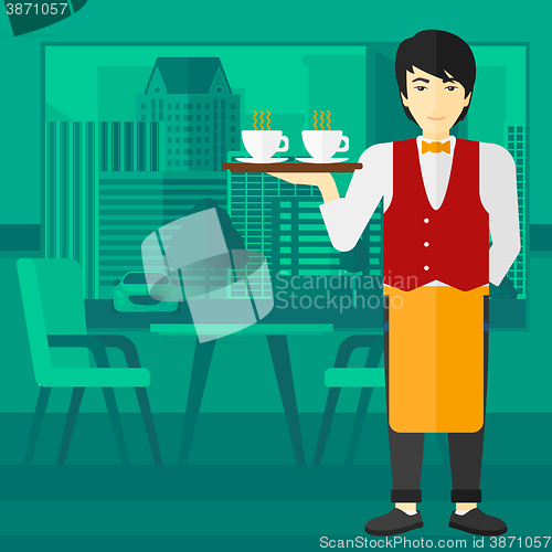 Image of Waiter holding tray with beverages.