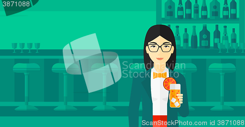 Image of Woman holding glass of juice.