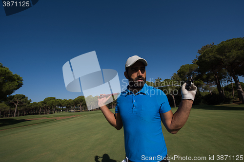 Image of golf player portrait at course
