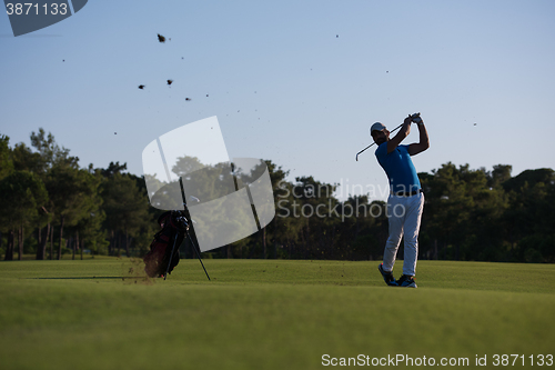 Image of golfer hitting long shot