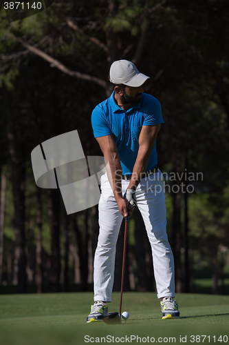 Image of golf player hitting shot