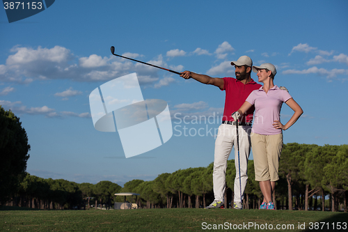 Image of portrait of couple on golf course