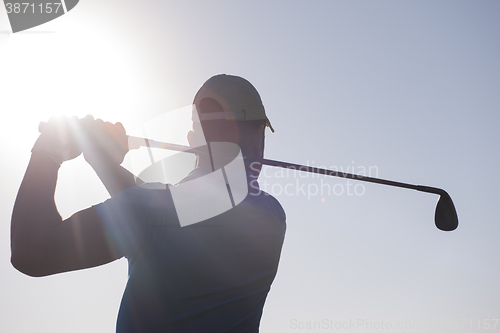Image of golf player hitting shot
