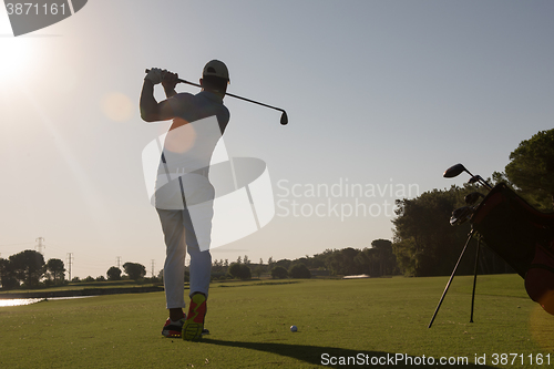 Image of golf player hitting shot