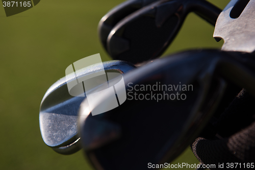 Image of close up golf bag on course