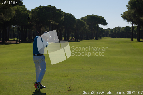 Image of golf player hitting shot