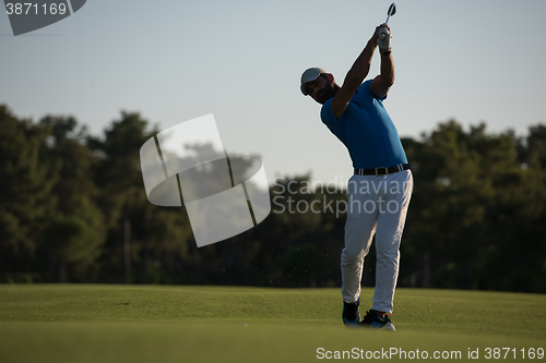 Image of golfer hitting long shot