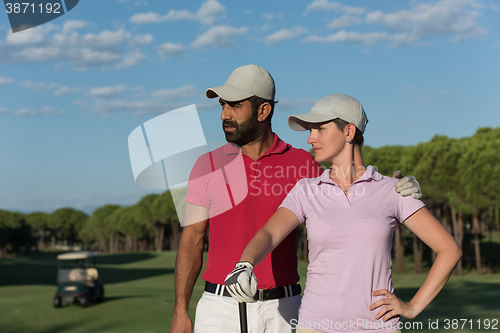 Image of portrait of couple on golf course