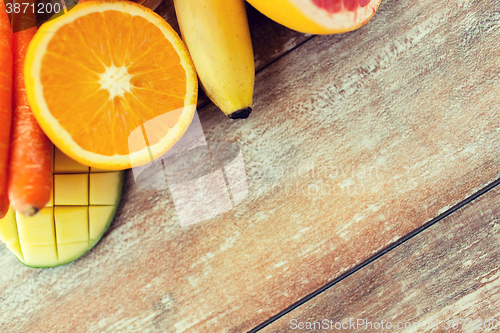 Image of close up of fresh juicy fruits on table