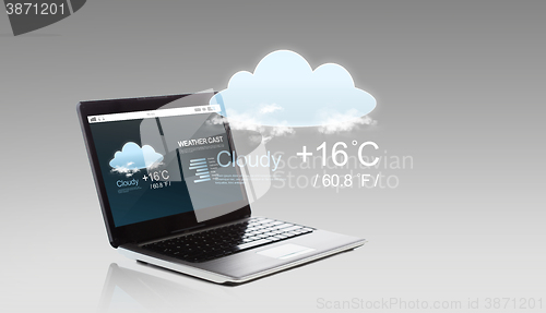 Image of laptop computer with weather cast on screen