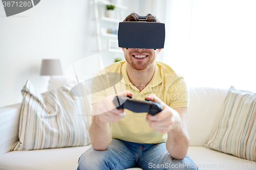 Image of man in virtual reality headset with controller