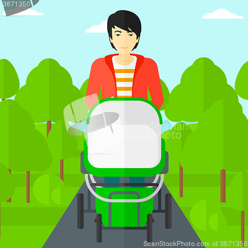 Image of Man pushing pram.