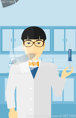 Image of Doctor with syringe in laboratory.